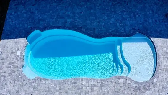 Roatan Beach fiberglass pool by Rainforest Pools n Composites