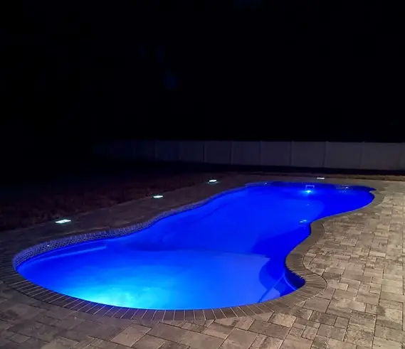 Roatan Beach fiberglass pool by Rainforest Pools n Composites