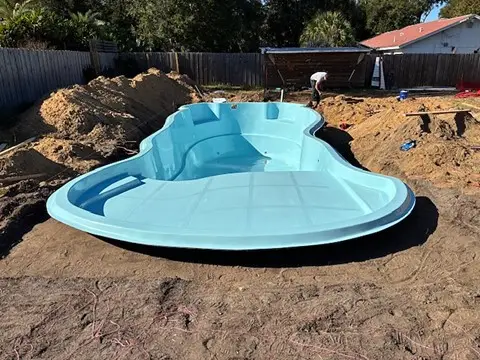 Roatan Beach fiberglass pool by Rainforest Pools n Composites