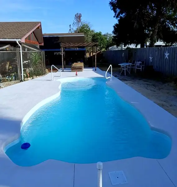 Roatan Beach fiberglass pool by Rainforest Pools n Composites