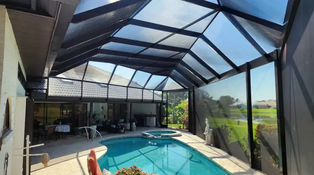 Mansard pool screen enclosure in Florida